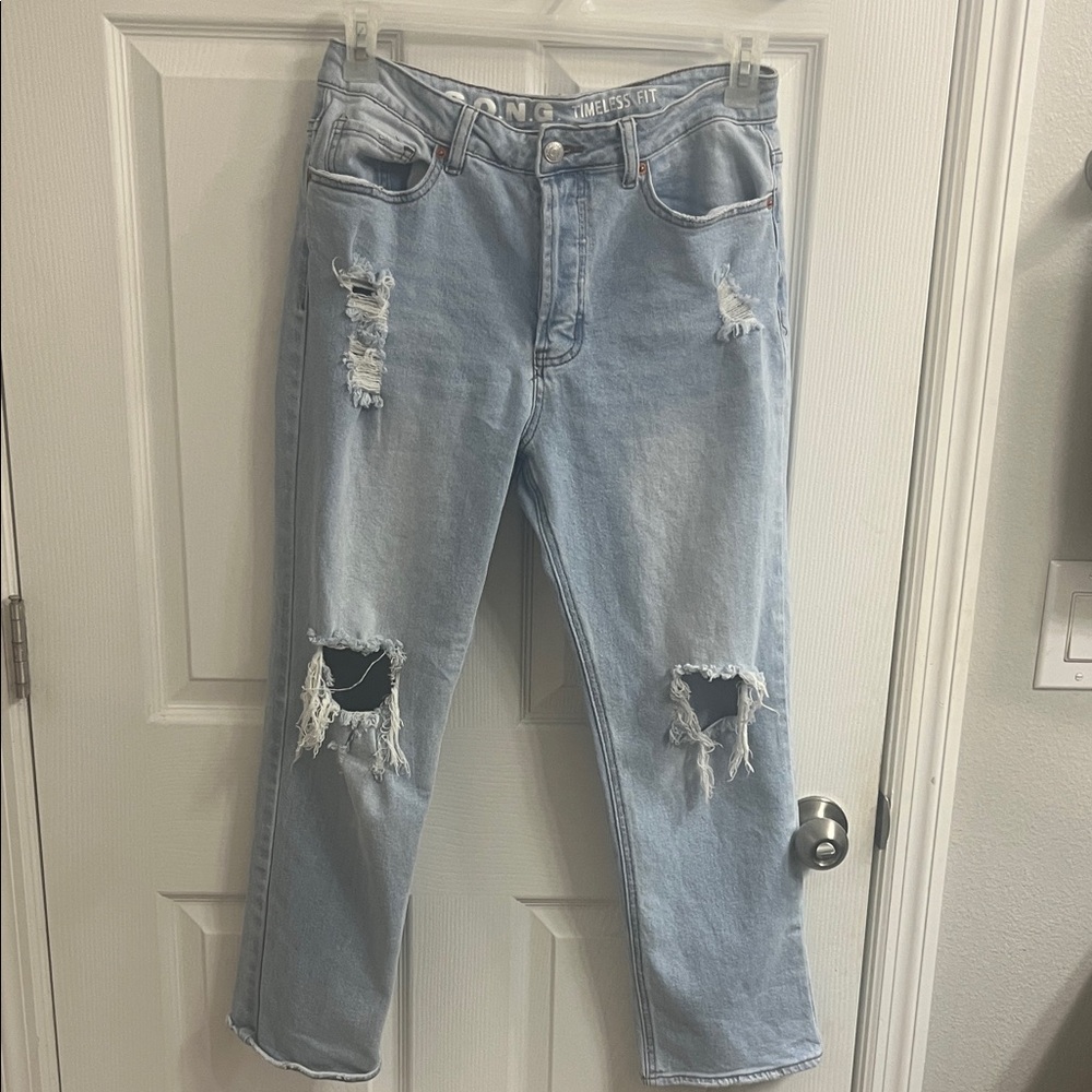 Women's Light Blue Distressed Jeans